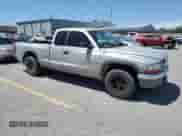 2000 Dodge Dakota Sport с VIN 1B7GL22N5YS591632, выставлен на аукционе Copart как лот 67930025 с пробегом 148 828 миль миль и Списание • Salvage title. История ставок и продаж доступна на DreamBid. Изображение 4.