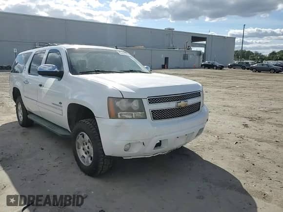 2011 Chevrolet Suburban LTZ with VIN 1GNSKKE3XBR375496, listed as a Copart auction lot 84406185 with 254,418 mi miles and Salvage title. Bid and sale history available at DreamBid. Image 14.