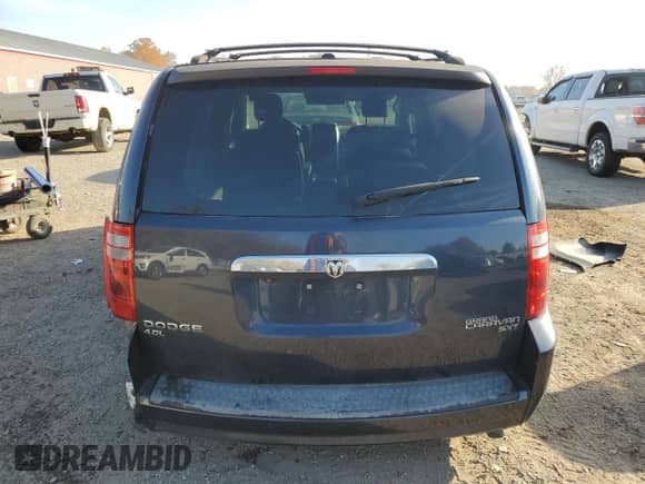 2009 Dodge Caravan with VIN 2D8HN44X39R672674, listed as a Copart auction lot 73094654 with 205,972 mi miles and Salvage title. Bid and sale history available at DreamBid. Image 6.