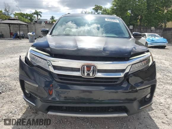 2022 Honda Pilot Touring 7-Passenger with VIN 5FNYF5H60NB034388, listed as a Copart auction lot 65687615 with 49,231 mi miles and Salvage title. Bid and sale history available at DreamBid. Image 5.
