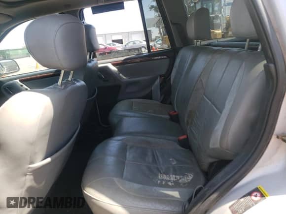 2003 Jeep Grand Cherokee Overland с VIN 1J8GW68J33C562757, выставлен на аукционе Copart как лот 63932685 с пробегом 197 636 миль миль и Чистый • Clean title. История ставок и продаж доступна на DreamBid. Изображение 12.