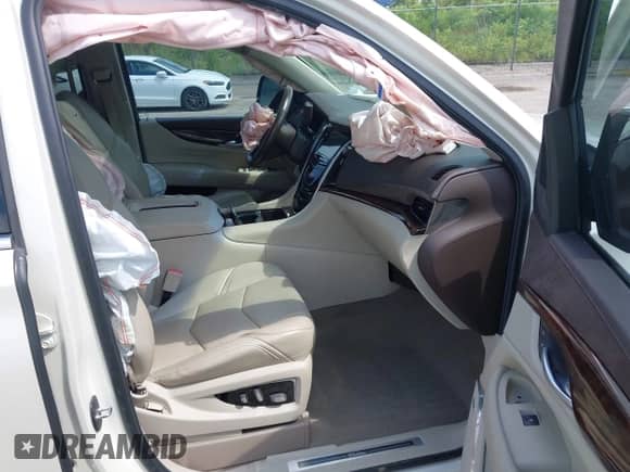 2015 Cadillac Escalade Premium z VIN 1GYS4NKJ3FR511782, wystawiony jako IAAI lot #42763519 z przebiegiem 155 146 mil mil oraz . Historia ofert i sprzedaży dostępna na DreamBid. Obrazek 5.