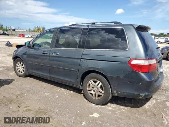 2005 Honda Odyssey EX с VIN 5FNRL38495B401224, выставлен на аукционе Copart как лот 80556355 с пробегом 258 303 миль миль и Списание • Salvage title. История ставок и продаж доступна на DreamBid. Изображение 2.
