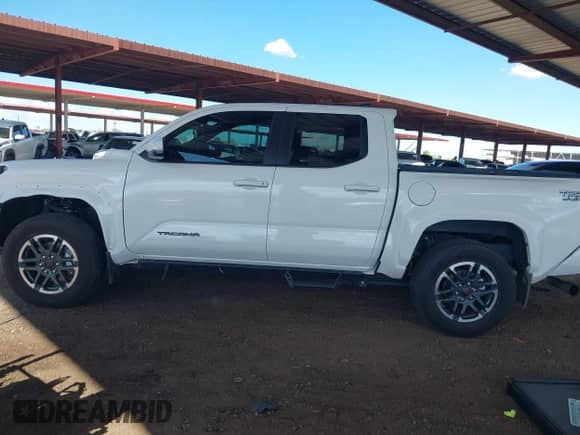 2024 Toyota Tacoma SR5 with VIN 3TMLB5JN2RM050911, listed as a IAAI auction lot 43169415 with 19,000 mi miles and . Bid and sale history available at DreamBid. Image 15.