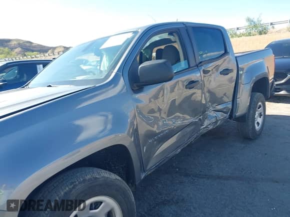 2021 Chevrolet Colorado 2WD Work Truck с VIN 1GCGSBEA5M1130412, выставлен на аукционе IAAI как лот 41935021 с пробегом 56 475 миль миль и . История ставок и продаж доступна на DreamBid. Изображение 6.