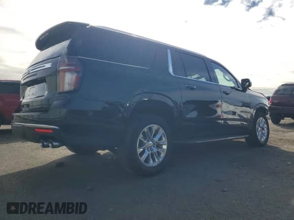 2021 Chevrolet Suburban Premier с VIN 1GNSKFKD8MR301307, выставлен на аукционе Copart как лот 90819155 с пробегом 55 562 миль миль и Списание • Salvage title. История ставок и продаж доступна на DreamBid. Изображение 3.