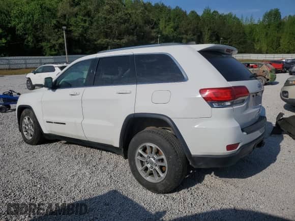 2019 Jeep Grand Cherokee Laredo E with VIN 1C4RJEAG2KC732645, listed as a Copart auction lot 53336495 with 76,221 mi miles and Salvage title. Bid and sale history available at DreamBid. Image 2.