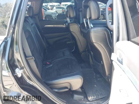 2016 Jeep Grand Cherokee SRT with VIN 1C4RJFDJ8GC306401, listed as a IAAI auction lot 42782259 with 116,318 mi miles and . Bid and sale history available at DreamBid. Image 8.