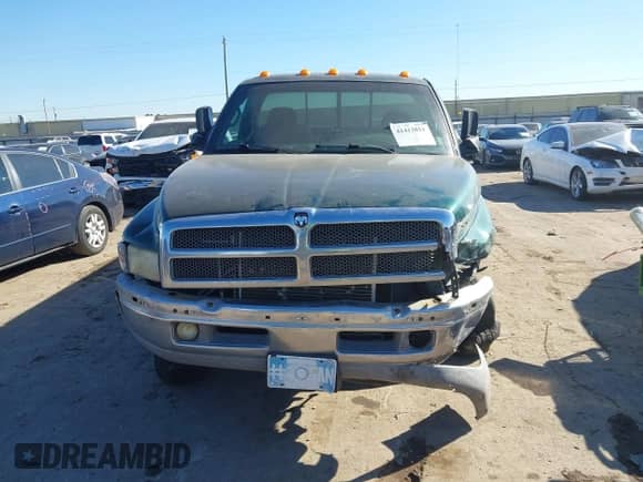2002 Dodge 2500 with VIN 3B7KF26Z12M228338, listed as a IAAI auction lot 41413851 with 115,534 mi miles and . Bid and sale history available at DreamBid. Image 12.