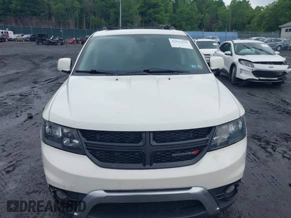 2019 Dodge Journey Crossroad z VIN 3C4PDDGGXKT765137, wystawiony jako IAAI lot #42527630 z przebiegiem 115 668 mil mil oraz . Historia ofert i sprzedaży dostępna na DreamBid. Obrazek 12.
