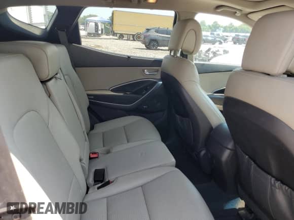 2015 Hyundai Santa Fe с VIN 5XYZW4LA6FG264053, выставлен на аукционе Copart как лот 68638645 с пробегом 83 426 миль миль и Списание • Salvage title. История ставок и продаж доступна на DreamBid. Изображение 11.