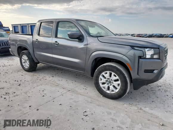 2023 Nissan Frontier S with VIN 1N6ED1EK0PN647051, listed as a Copart auction lot 62260455 with 58,902 mi miles and Salvage title. Bid and sale history available at DreamBid. Image 4.
