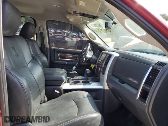 2012 Ram 1500 Laramie with VIN 1C6RD7JT7CS285521, listed as a Copart auction lot 66032875 with 143,555 mi miles and Salvage title. Bid and sale history available at DreamBid. Image 7.