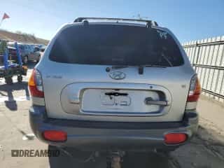 2002 Hyundai Santa Fe GLS z VIN KM8SC13D02U311312, wystawiony jako Copart lot #85943534 z przebiegiem 307 758 mil mil oraz Szkoda całkowita • Salvage title. Historia ofert i sprzedaży dostępna na DreamBid. Obrazek 6.