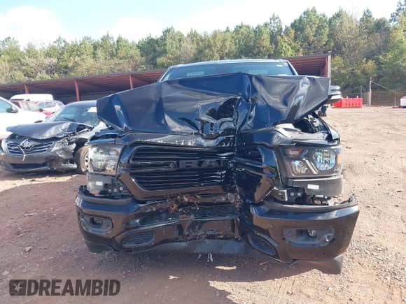 2019 Ram 1500 Big Horn z VIN 1C6SRFFT8KN797002, wystawiony jako IAAI lot #43236304 z przebiegiem 102 773 mil mil oraz . Historia ofert i sprzedaży dostępna na DreamBid. Obrazek 13.