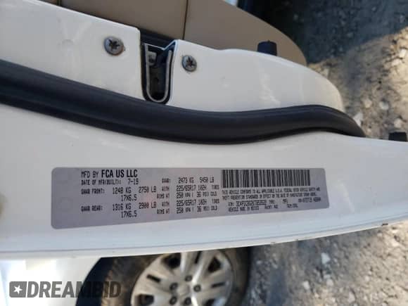 2019 Dodge Journey SE z VIN 3C4PDCBG2KT853522, wystawiony jako Copart lot #70498035 z przebiegiem 81 445 mil mil oraz Szkoda całkowita • Salvage title. Historia ofert i sprzedaży dostępna na DreamBid. Obrazek 13.