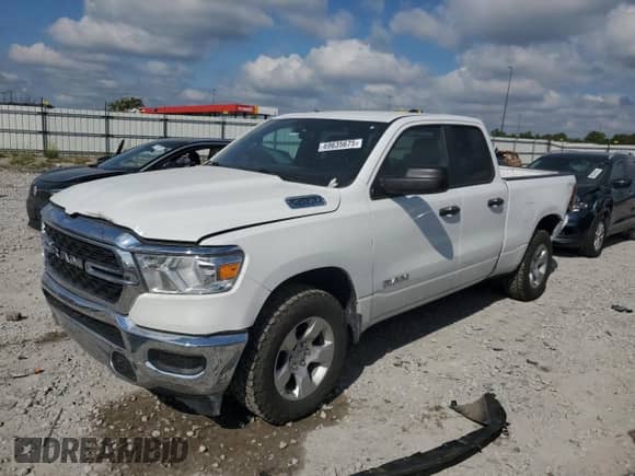 2023 Ram 1500 Big Horn with VIN 1C6SRFBTXPN558127, listed as a Copart auction lot 69635675 with 105,950 mi miles and Salvage title. Bid and sale history available at DreamBid. Image 1.