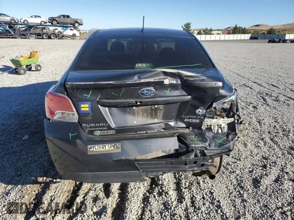 2015 Subaru Impreza z VIN JF1GJAA6XFH003217, wystawiony jako Copart lot #87069595 z przebiegiem 92 438 mil mil oraz Szkoda całkowita • Salvage title. Historia ofert i sprzedaży dostępna na DreamBid. Obrazek 6.