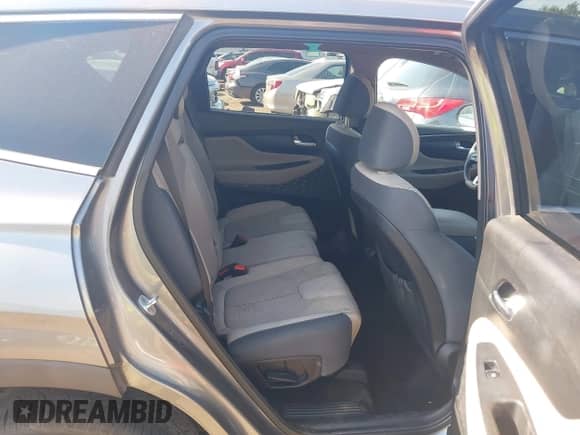 2019 Hyundai Santa Fe SEL Plus with VIN 5NMS33AD2KH095554, listed as a IAAI auction lot 43207351 with 96,001 mi miles and . Bid and sale history available at DreamBid. Image 8.