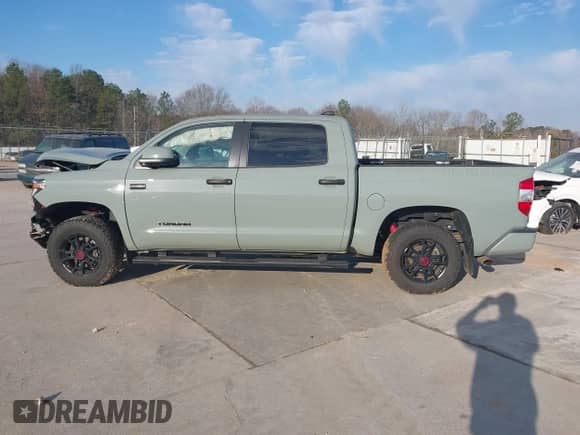 2021 Toyota Tundra SR5 with VIN 5TFDY5F14MX046533, listed as a IAAI auction lot 41663194 with 55,758 mi miles and . Bid and sale history available at DreamBid. Image 14.