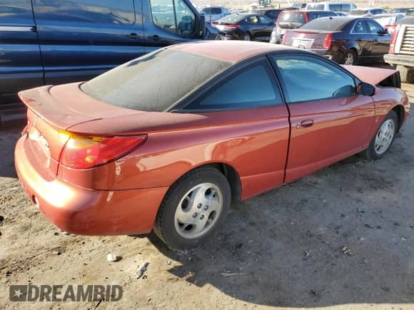 2002 Saturn SC with VIN 1G8ZR12722Z165666, listed as a Copart auction lot 82907074 with 70,051 mi miles and Salvage title. Bid and sale history available at DreamBid. Image 3.