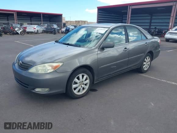 2004 Toyota Camry LE with VIN 4T1BE32K24U864455, listed as a IAAI auction lot 42496214 with 159,100 mi miles and . Bid and sale history available at DreamBid. Image 18.