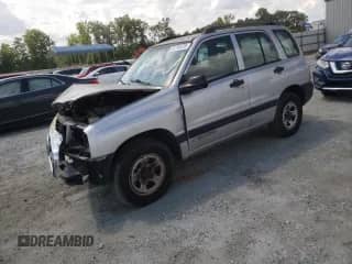 2003 Chevrolet Tracker с VIN 2CNBE13C136914772, выставлен на аукционе Copart как лот 64744475 с пробегом Не указан миль и Списание • Salvage title. История ставок и продаж доступна на DreamBid. Изображение 1.