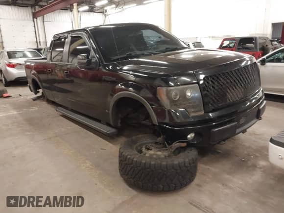 2012 Ford F-150 XL with VIN 1FTFW1ETXCFB77108, listed as a IAAI auction lot 42592030 with 164,464 mi miles and . Bid and sale history available at DreamBid. Image 1.