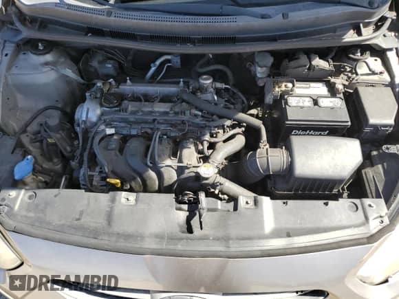 2014 Hyundai Accent GLS z VIN KMHCT4AEXEU591164, wystawiony jako Copart lot #82646655 z przebiegiem 135 583 mil mil oraz Czysty tytuł • Clean title. Historia ofert i sprzedaży dostępna na DreamBid. Obrazek 11.