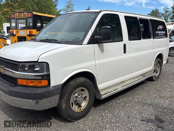 2014 Chevrolet Express Passenger LT с VIN 1GAZGYFG0E1198563, выставлен на аукционе Copart как лот 81248665 с пробегом 251 391 миль миль и Чистый • Clean title. История ставок и продаж доступна на DreamBid. Изображение 2.