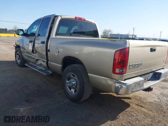 2003 Dodge 2500 ST z VIN 3D7KA28683G798828, wystawiony jako IAAI lot #41916912 z przebiegiem 148 284 mil mil oraz . Historia ofert i sprzedaży dostępna na DreamBid. Obrazek 3.