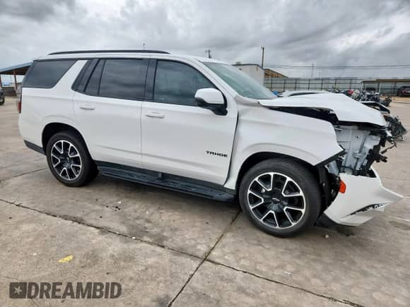 2023 Chevrolet Tahoe RST with VIN 1GNSCRKD3PR297668, listed as a Copart auction lot 60535755 with 39,747 mi miles and Salvage title. Bid and sale history available at DreamBid. Image 4.