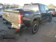 2024 Toyota Tacoma SR5 with VIN 3TYLB5JN3RT032583, listed as a IAAI auction lot 41404527 with 7,130 mi miles and . Bid and sale history available at DreamBid. Image 4.