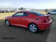 2003 Hyundai Tiburon GT с VIN KMHHN65F63U060104, выставлен на аукционе Copart как лот 84560184 с пробегом 160 120 миль миль и Чистый • Clean title. История ставок и продаж доступна на DreamBid. Изображение 2.