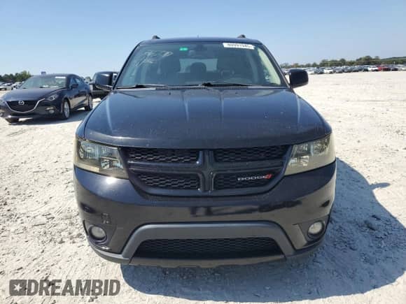 2019 Dodge Journey SE with VIN 3C4PDCBG0KT802777, listed as a Copart auction lot 80991945 with 174,659 mi miles and Salvage title. Bid and sale history available at DreamBid. Image 5.