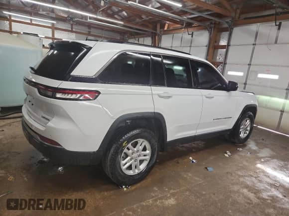 2023 Jeep Grand Cherokee Altitude with VIN 1C4RJHAG4PC543746, listed as a Copart auction lot 71586265 with 70,824 mi miles and Salvage title. Bid and sale history available at DreamBid. Image 3.