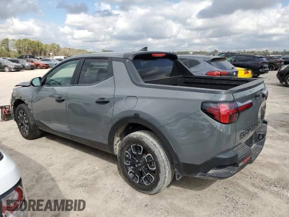 2023 Hyundai Santa Cruz SEL z VIN 5NTJB4AE5PH040718, wystawiony jako Copart lot #41083834 z przebiegiem 14 809 mil mil oraz Szkoda całkowita • Salvage title. Historia ofert i sprzedaży dostępna na DreamBid. Obrazek 2.