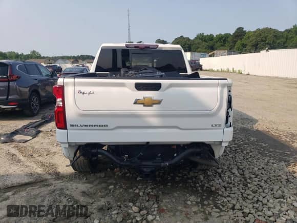 2022 Chevrolet Silverado 1500 LTZ with VIN 3GCPWEED8NG101442, listed as a Copart auction lot 58603855 with 33,570 mi miles and Salvage title. Bid and sale history available at DreamBid. Image 6.