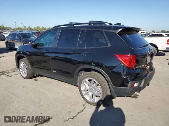 2024 Honda Passport EX-L with VIN 5FNYF8H53RB020581, listed as a Copart auction lot 82087435 with 20,595 mi miles and Salvage title. Bid and sale history available at DreamBid. Image 2.