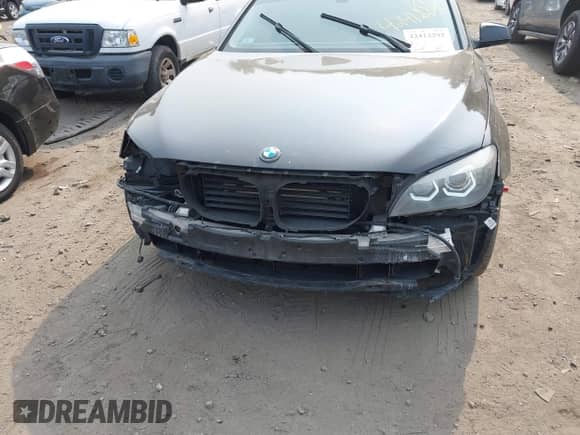 2012 BMW 7 Series 750Li xDrive with VIN WBAKC8C5XCC436425, listed as a IAAI auction lot 42412292 with 186,152 mi miles and . Bid and sale history available at DreamBid. Image 6.