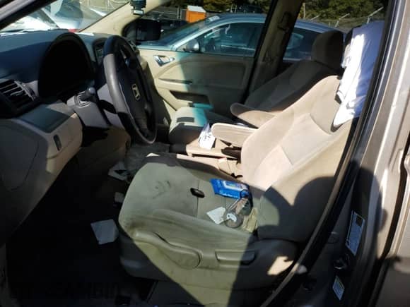 2005 Honda Odyssey LX с VIN 5FNRL38255B031873, выставлен на аукционе Copart как лот 87105105 с пробегом 301 626 миль миль и Списание • Salvage title. История ставок и продаж доступна на DreamBid. Изображение 7.