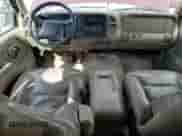 1999 Chevrolet Tahoe Z71 with VIN 1GNEK13R7XR129141, listed as a Copart auction lot 59526055 with 291,093 mi miles and Salvage title. Bid and sale history available at DreamBid. Image 8.