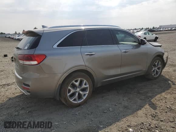 2018 Kia Sorento SX z VIN 5XYPKDA56JG430086, wystawiony jako Copart lot #70511555 z przebiegiem 137 144 mil mil oraz Szkoda całkowita • Salvage title. Historia ofert i sprzedaży dostępna na DreamBid. Obrazek 3.