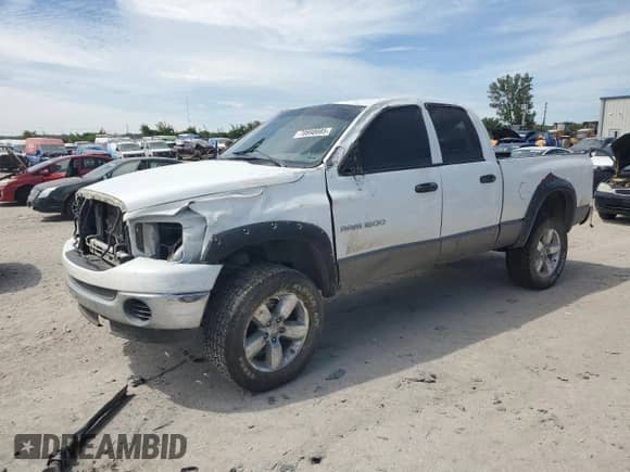 2007 Dodge 1500 SLT with VIN 1D7HU18P57J583898, listed as a Copart auction lot 70890085 with 314,417 mi miles and Salvage title. Bid and sale history available at DreamBid. Image 1.