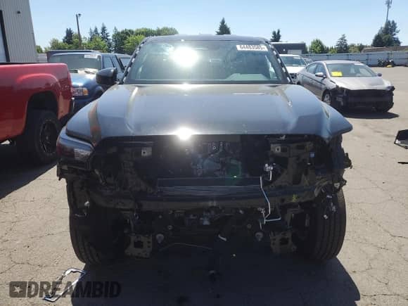 2024 Toyota Tacoma TRD Off Road with VIN 3TMLB5JN1RM085942, listed as a Copart auction lot 64483585 with 1,975 mi miles and Salvage title. Bid and sale history available at DreamBid. Image 5.