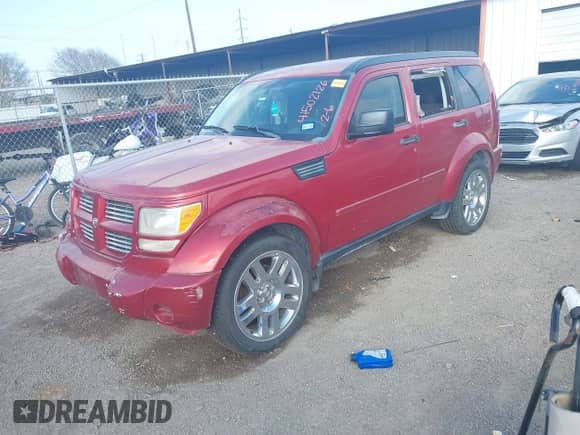 2010 Dodge Nitro Heat with VIN 1D4PT4GK9AW163221, listed as a IAAI auction lot 41502126 with 195,553 mi miles and . Bid and sale history available at DreamBid. Image 2.