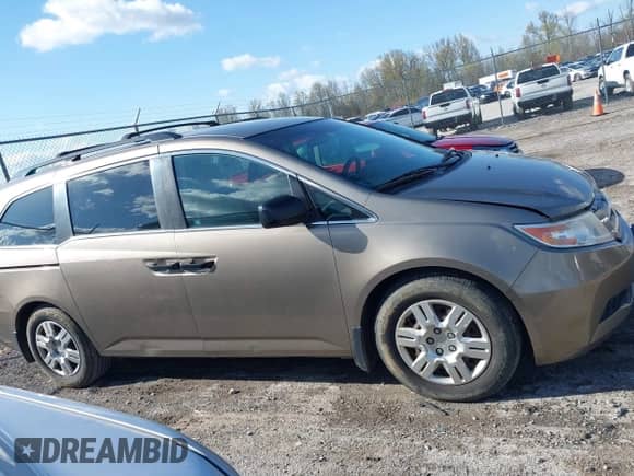 2012 Honda Odyssey LX z VIN 5FNRL5H29CB091860, wystawiony jako IAAI lot #42000688 z przebiegiem 295 551 mil mil oraz . Historia ofert i sprzedaży dostępna na DreamBid. Obrazek 13.