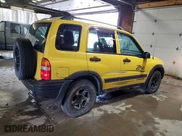 2003 Chevrolet Tracker ZR2 с VIN 2CNBJ734736904853, выставлен на аукционе Copart как лот 60247995 с пробегом 133 709 миль миль и Чистый • Clean title. История ставок и продаж доступна на DreamBid. Изображение 3.