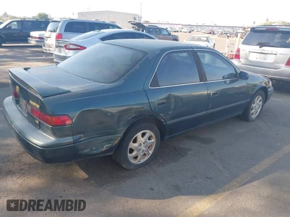 1997 Toyota Camry LE z VIN JT2BF22K1V0022364, wystawiony jako IAAI lot #42900943 z przebiegiem 283 129 mil mil oraz . Historia ofert i sprzedaży dostępna na DreamBid. Obrazek 4.