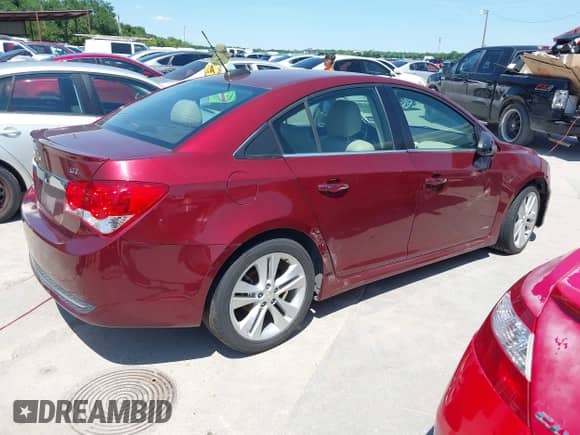 2015 Chevrolet Cruze LTZ with VIN 1G1PG5SB5F7279010, listed as a IAAI auction lot 42381645 with 174,725 mi miles and . Bid and sale history available at DreamBid. Image 4.